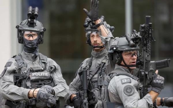 Police officers from the special intervention service stand outside the Erasmus Medical Center